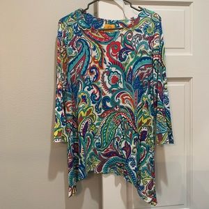Woman’s top shark bite hem tunic